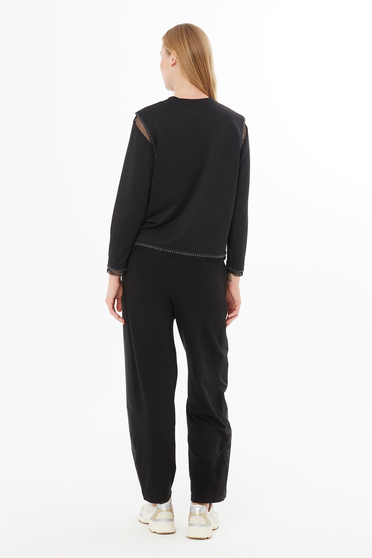 Black Blouse with Sheer Stitching Details