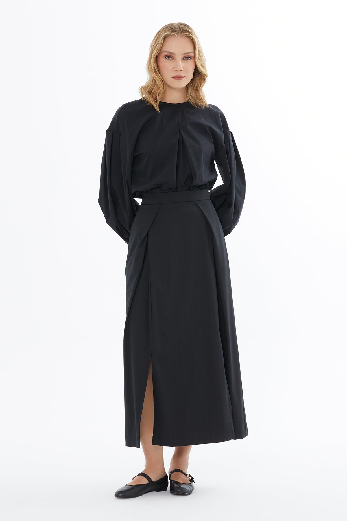 Black Skirt with Front Pleat Detail