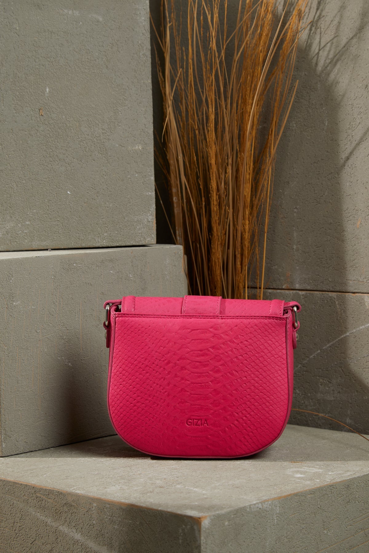 Adjustable Strapped Leather Bag with Front Belt Buckle Pattern