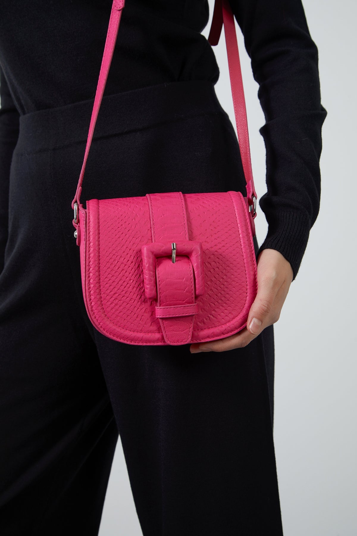 Adjustable Strapped Leather Bag with Front Belt Buckle Pattern