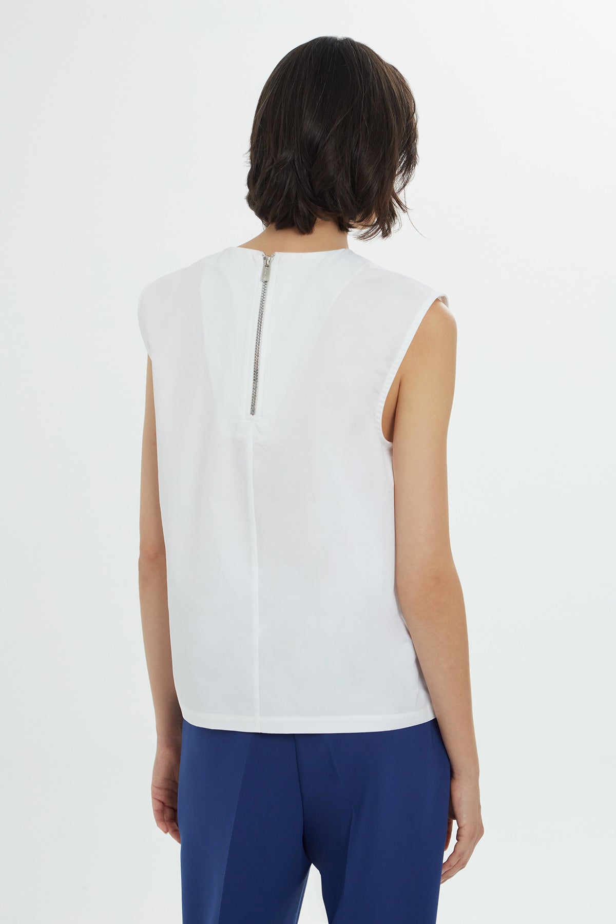 White Pleated Panel Sleeveless Blouse