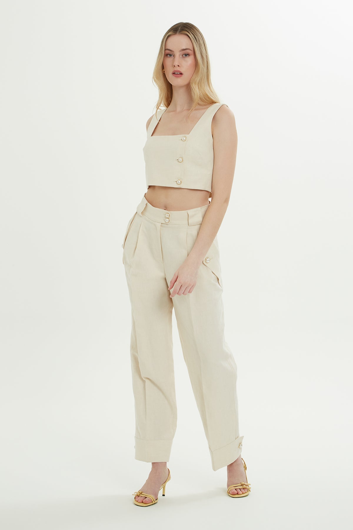 Beige Trousers with Gold Button Detail