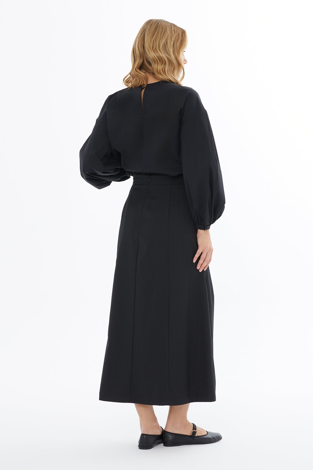 Black Skirt with Front Pleat Detail