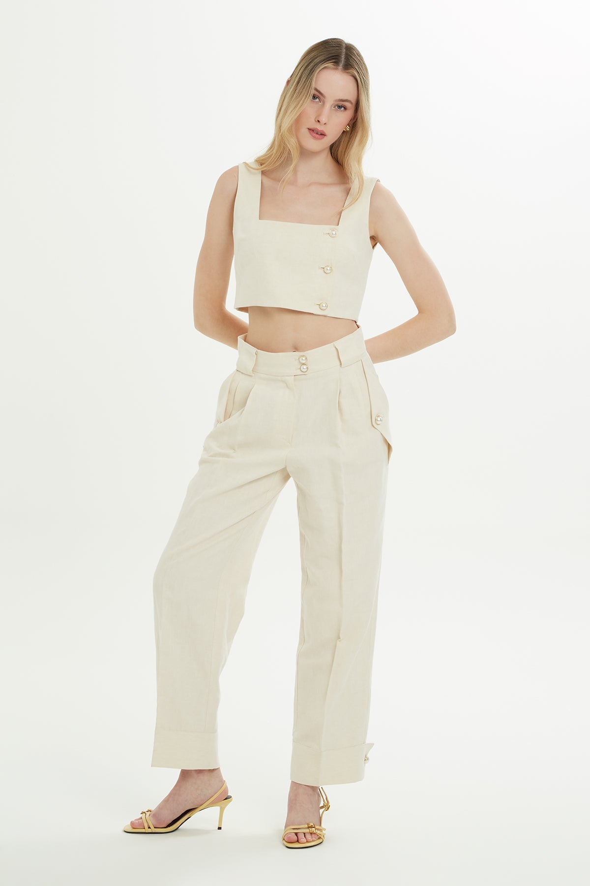 Beige Trousers with Gold Button Detail