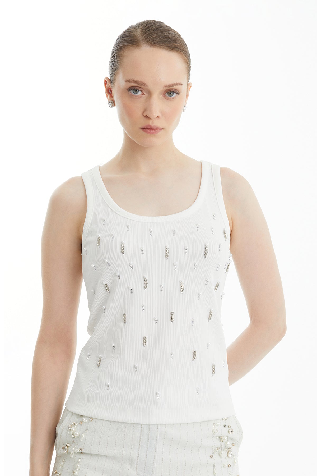 White Embroidered Sleeveless Blouse